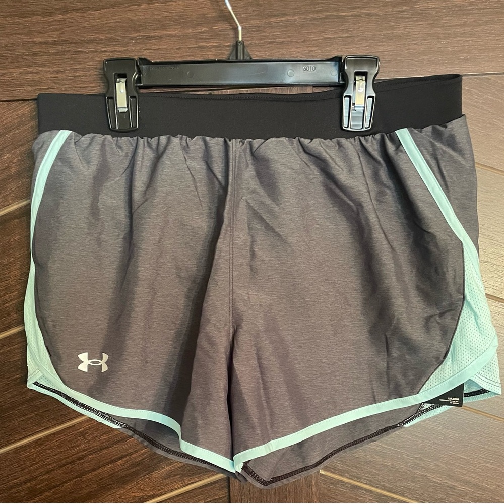 NWT Under Armour loose fit running shorts for women.  Size medium
